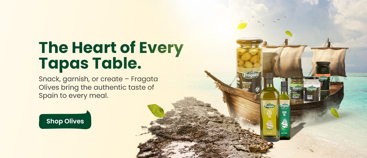 Advertisement for Fragata Olives with a ship and olives on a beach background.